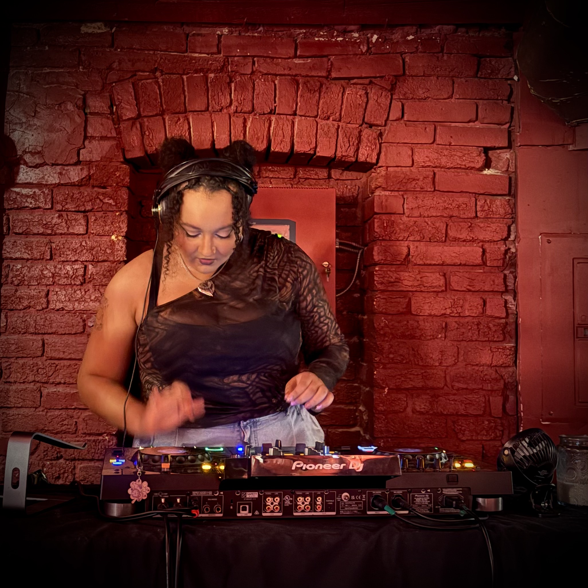 Logan djing at a club